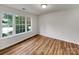 This bedroom has a large window that offers plenty of natural light at 12307 Poplar Forest Dr, Charlotte, NC 28278