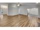 Spacious living room featuring wood floors and a modern color palette at 12307 Poplar Forest Dr, Charlotte, NC 28278