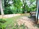 Backyard featuring a new wooden fence and abundant foliage and grass at 125 Todd Nw Dr, Concord, NC 28025