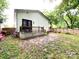 View of the backyard showing the fence, patio, and green space at 125 Todd Nw Dr, Concord, NC 28025