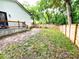 An expansive fenced backyard with the home's siding in view at 125 Todd Nw Dr, Concord, NC 28025