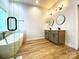 Bathroom with walk-in shower, free-standing tub, and double sink vanity at 125 Todd Nw Dr, Concord, NC 28025