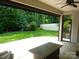 Enjoy the outdoor patio, overlooking a well-maintained yard and lush landscaping at 1311 Stonecroft Nw Ln, Concord, NC 28027