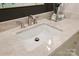 Bathroom with a cream colored marble countertop and brushed nickel faucet at 14652 Villalonga Ln, Charlotte, NC 28277