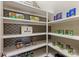 Well-organized pantry with ample shelving provides plenty of storage space for groceries and household items at 14652 Villalonga Ln, Charlotte, NC 28277