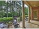 Inviting patio with brick and concrete, comfortable seating, and lush greenery for outdoor relaxation at 14652 Villalonga Ln, Charlotte, NC 28277