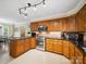 Well-equipped kitchen boasts stainless steel appliances, ample cabinets, and granite countertops at 1518 Appaloosa Way, Gastonia, NC 28056
