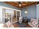 Enjoy the tranquil balcony with comfortable furniture, water views, and stylish decor at 18679 Vineyard Point Ln, Cornelius, NC 28031