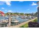 Breathtaking waterfront view showcasing the marina, boats, and serene surroundings at 18679 Vineyard Point Ln, Cornelius, NC 28031