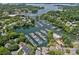 Aerial view of a waterfront community with a marina, showcasing the neighborhood's proximity to water and recreational opportunities at 19746 Valiant Way, Cornelius, NC 28031