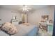Bedroom features a ceiling fan, desk area and carpeted floors at 211 Tyndale Ct, Waxhaw, NC 28173