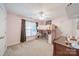 Bedroom with bunk bed and desk area, ceiling fan, and large window at 211 Tyndale Ct, Waxhaw, NC 28173