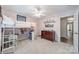Bedroom features a ceiling fan, desk, and carpeted floors at 211 Tyndale Ct, Waxhaw, NC 28173