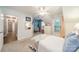 Bright bedroom features views, a ceiling fan, carpeted floors, and desk nook at 211 Tyndale Ct, Waxhaw, NC 28173