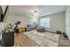 Bonus room with light colored walls, vinyl flooring, and modern decor at 211 Tyndale Ct, Waxhaw, NC 28173