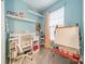 Dedicated desk nook area features a window with a view and built-in shelving at 211 Tyndale Ct, Waxhaw, NC 28173