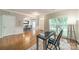 Welcoming foyer area with hardwood floors, dining room view, and ample natural light for an inviting entrance at 211 Tyndale Ct, Waxhaw, NC 28173
