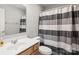 Bathroom featuring a combination shower and tub and vanity with sink at 219 Broadleaf Dr, Denver, NC 28037