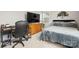 Bedroom featuring a bed, desk, and dresser, perfect for a home office setup at 219 Broadleaf Dr, Denver, NC 28037