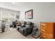 Bonus room featuring an exercise bike and home office space at 219 Broadleaf Dr, Denver, NC 28037