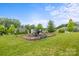 Community playground with slides and climbing structures, set in a grassy and landscaped area at 219 Broadleaf Dr, Denver, NC 28037