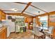 Well-lit kitchen with ample cabinet space, neutral countertops, and cozy decor at 2289 Mccloud St, Denver, NC 28037