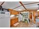 Well-lit kitchen with ample cabinet space, neutral countertops, and cozy decor at 2289 Mccloud St, Denver, NC 28037
