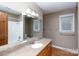 Bathroom with tiled countertop vanity, toilet, and shower at 2605 Camelot Dr, Rock Hill, SC 29732