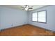 Bedroom featuring a ceiling fan, window with blinds, and hardwood floors at 2605 Camelot Dr, Rock Hill, SC 29732