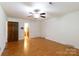 Bedroom featuring a ceiling fan, window with blinds, and hardwood floors at 2605 Camelot Dr, Rock Hill, SC 29732