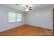 Bedroom featuring a ceiling fan, window with blinds, and hardwood floors at 2605 Camelot Dr, Rock Hill, SC 29732