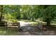 Long driveway leading to a private home surrounded by lush greenery at 2605 Camelot Dr, Rock Hill, SC 29732