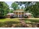 Traditional two-story brick home with white columns and inviting brick pathway at 2605 Camelot Dr, Rock Hill, SC 29732