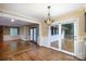 Open concept living room featuring glass patio doors to a wooden deck, and hardwood floors at 2605 Camelot Dr, Rock Hill, SC 29732