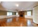 Bright living room with hardwood floors, fireplace, and built-in bookshelves at 2605 Camelot Dr, Rock Hill, SC 29732