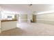 Spacious living area with adjacent kitchenette and access to upper floor at 2605 Camelot Dr, Rock Hill, SC 29732
