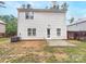 Back exterior of home with a concrete patio, and vinyl siding at 2618 Mt Holly Huntersville Rd, Charlotte, NC 28214