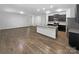 Open concept kitchen with stainless appliances and a large island at 2618 Mt Holly Huntersville Rd, Charlotte, NC 28214