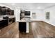 Spacious kitchen with granite countertops, stainless steel appliances, and dark cabinetry at 2618 Mt Holly Huntersville Rd, Charlotte, NC 28214