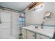 Clean bathroom featuring a shower and vanity with storage at 2951 Evergreen Trl, Vale, NC 28168