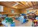 Spacious garage with wooden walls, shelving, and ample room for storage and projects at 2951 Evergreen Trl, Vale, NC 28168