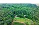 Aerial view of property boundaries showing the home's wooded acreage with mature trees at 2951 Evergreen Trl, Vale, NC 28168