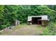 Outbuildings including shed and workshop on large lot with mature trees at 2951 Evergreen Trl, Vale, NC 28168