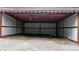 An empty, utilitarian shed with metal and wood structure at 2951 Evergreen Trl, Vale, NC 28168
