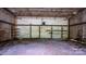Workshop interior view, showing concrete floor, metal walls, and open ceiling at 2951 Evergreen Trl, Vale, NC 28168