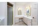 Spacious bathroom with walk-in shower, double mirrors, and light wood vanity at 2972 Kaneland Ct, Rock Hill, SC 29732