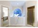 Bathroom features a walk-in tub with stained glass at 2972 Kaneland Ct, Rock Hill, SC 29732