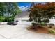The exterior of the home features an attached garage and a spacious driveway framed by landscaping at 2972 Kaneland Ct, Rock Hill, SC 29732