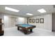 Inviting game room featuring a pool table and retro jukebox offers entertainment and relaxation at 2972 Kaneland Ct, Rock Hill, SC 29732