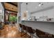 View of the kitchen with breakfast bar, modern appliances, and open layout to the living area at 310 Arlington Ave # 409, Charlotte, NC 28203